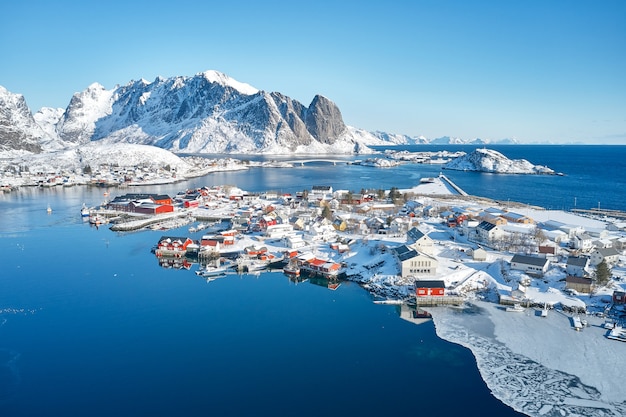 Charming typical fishing village in Reine, Lofoten Islands, Norway. Aerial view. Panoramic image. Breathtaking winter landscape.