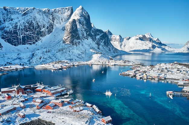 Charming typical fishing village in Reine, Lofoten Islands, Norway. Aerial view. Panoramic image. Breathtaking winter landscape.