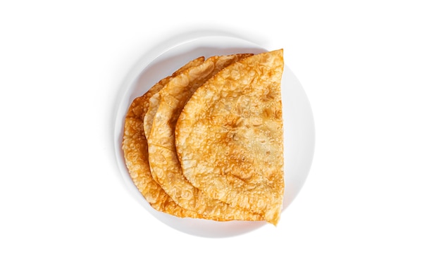 Chebureks are isolated on a white background