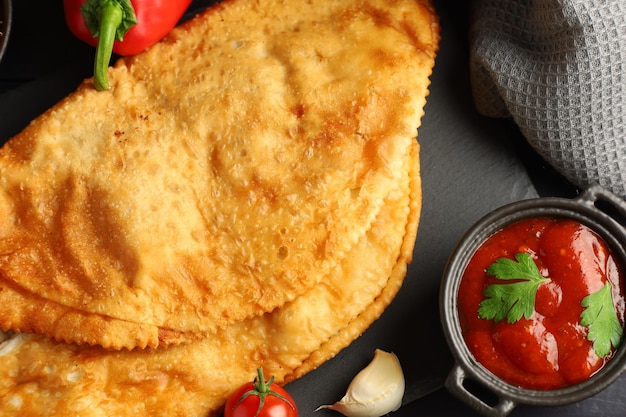 Chebureks with meat Tasty and appetizing food