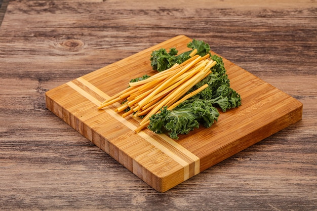 Chechel cheese sticks over board