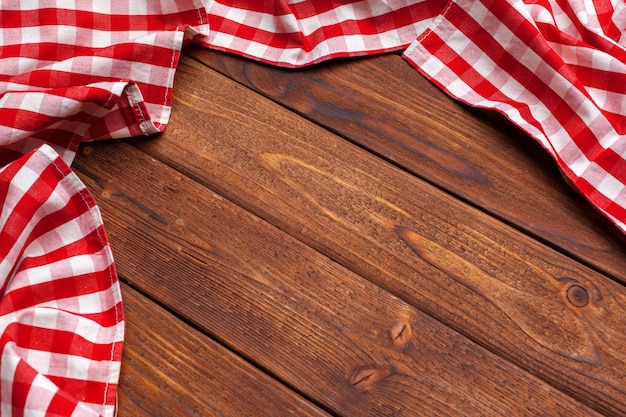 Checkered tablecloth on wooden table