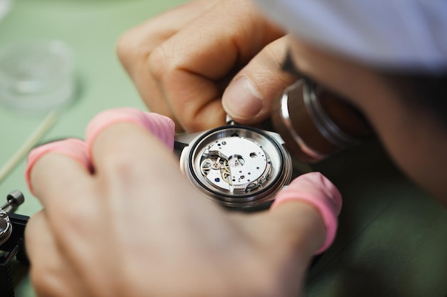 Checking motion of watch mechanism