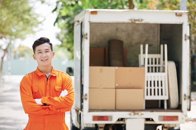 Cheerful Asian loader