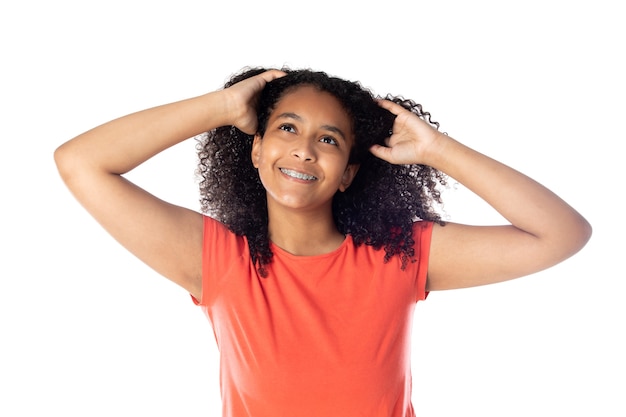 Cheerful black female student with afro hair isolated on a white background