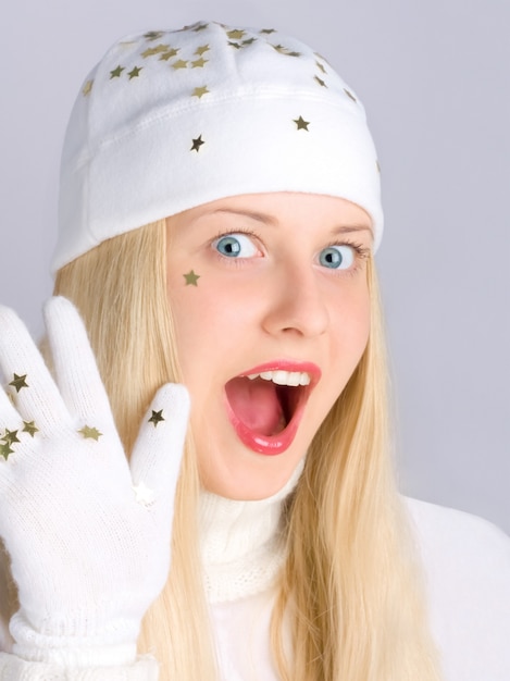 Cheerful blonde girl in Christmas time