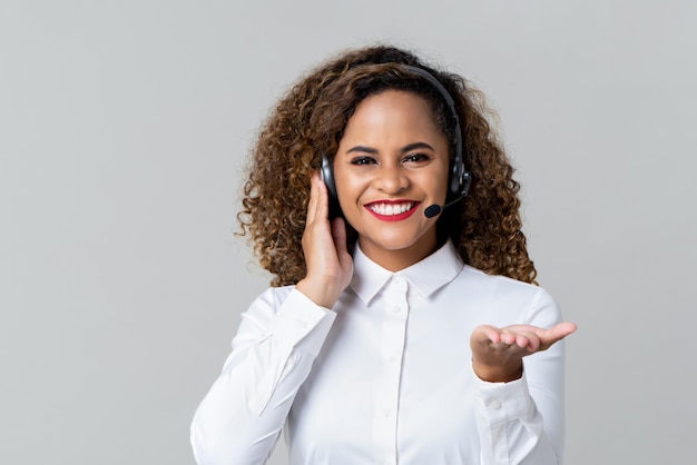 Cheerful call center woman with headphones