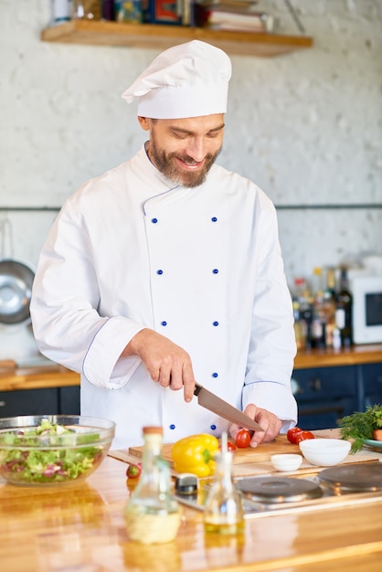 Cheerful Chef Working in Restaurant Kitchen