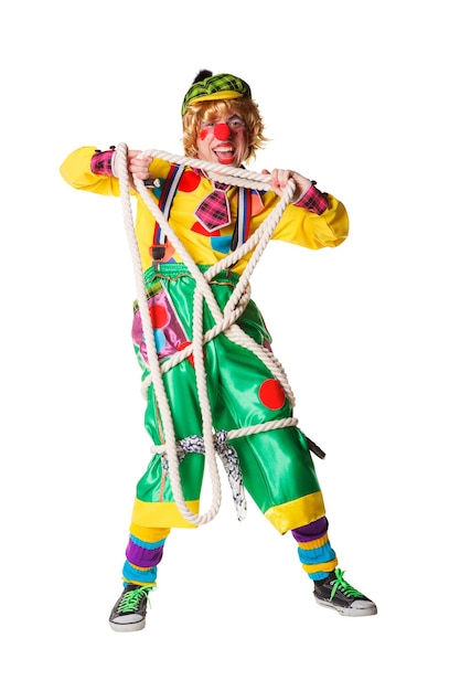 Cheerful clown got confused in a rope isolated on a white background