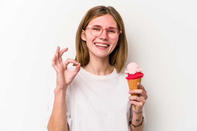 Cheerful and confident showing ok gesture