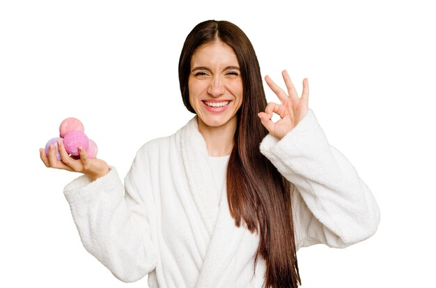 Photo cheerful and confident showing ok gesture