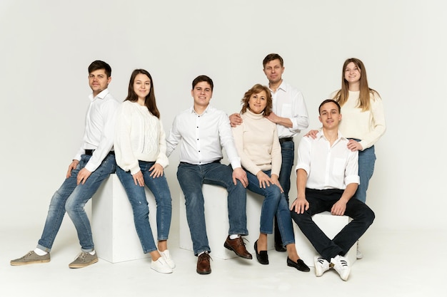 Cheerful family on a white background. people of different ages and nationalities. family members. group portrait on white background