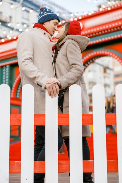 Cheerful happy and beautiful caucasian couple having date together outdoors