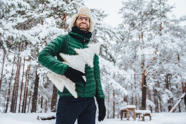 Cheerful male model dressed in winter clothes