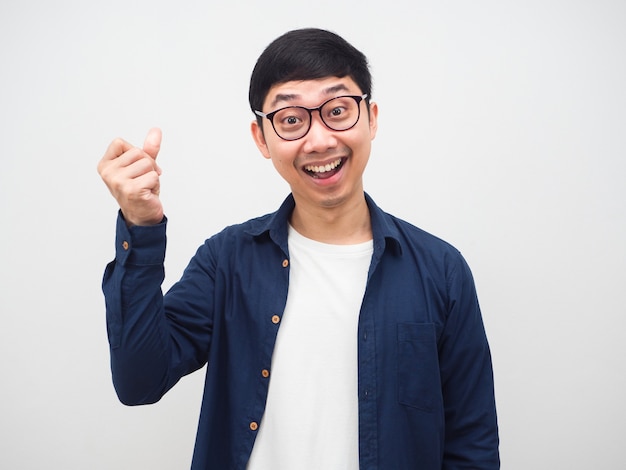 Cheerful man wearing glasses gesture flick finger for get idea white background