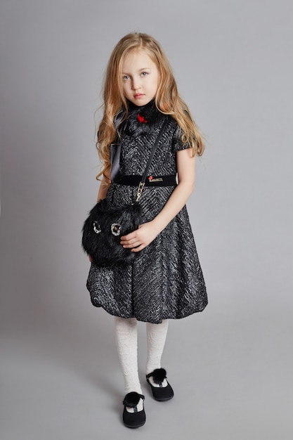 Cheerful positive girl beautiful dress black color