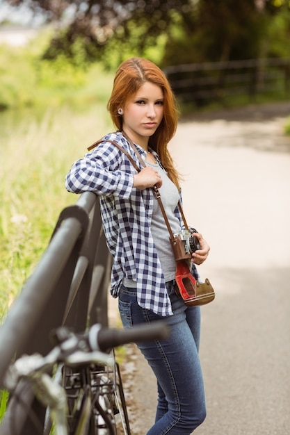 Cheerful redhead looking at camera