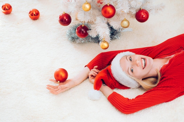 Cheerful young woman wearing christmas costume over wooden wall Funny Laughing Surprised Woman Portr