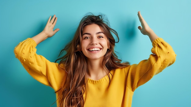 Photo cheerful young woman with bright smile showing copy space in blue background