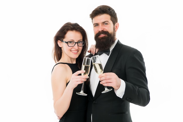 Cheers concept Couple classy clothes drink champagne white background Man bearded wear tuxedo girl elegant celebrate anniversary Holiday celbration Party celebration Official celebration event