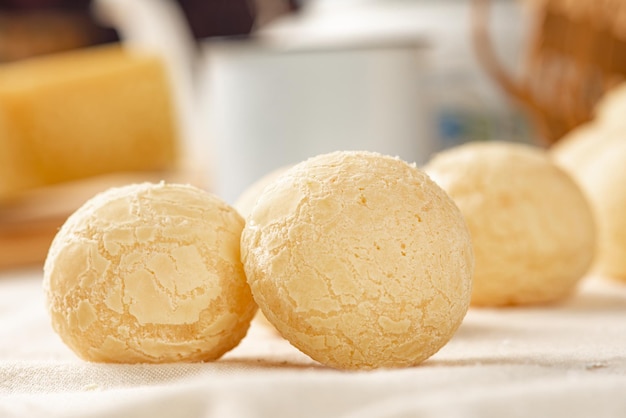 Cheese bread, breakfast table in Brazil, cheese bread in detail, selective focus.