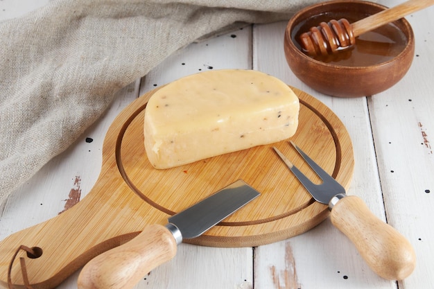 Cheese collection craft cow and goat milk cheese wooden table