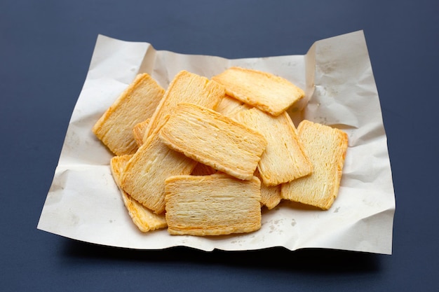 Cheese crispies on dark background