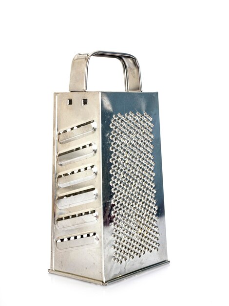 Cheese grater in front of white background