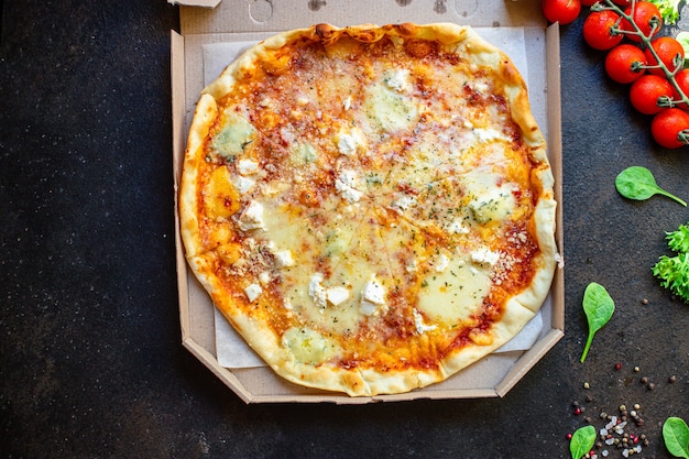 cheese pizza four types of cheeses and different varieties tomato sauce fresh