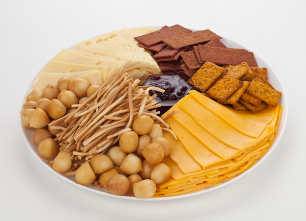 Cheese plate with smoked cheese and bread.