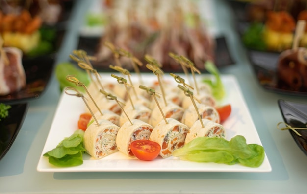 Cheese and salmon rolls Food delivery service the event Soft focus