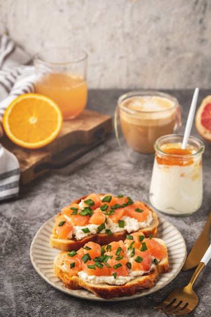 Cheese and salmon toasts on a plate