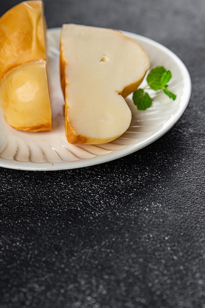 Photo cheese scamorza food snack on the table copy space food background rustic top view