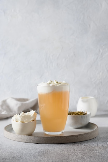 Cheese tea with layer of creamy foam Asian trendy beverage Thai milk tea