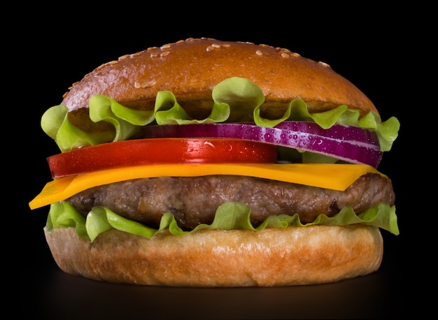 Cheeseburger on black background