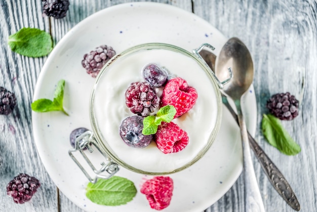 Cheesecake in portioned jars with summer berries