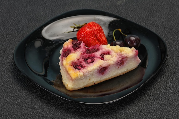 Cheesecake with cherry served strawberry