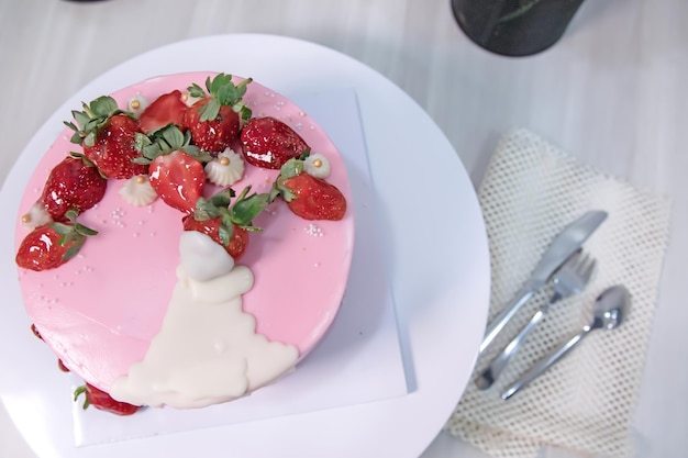 cheesecake with strawberry and fresh berries on white background