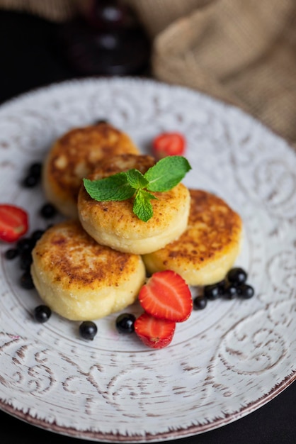 cheesecakes for breakfast with berries in a restaurant