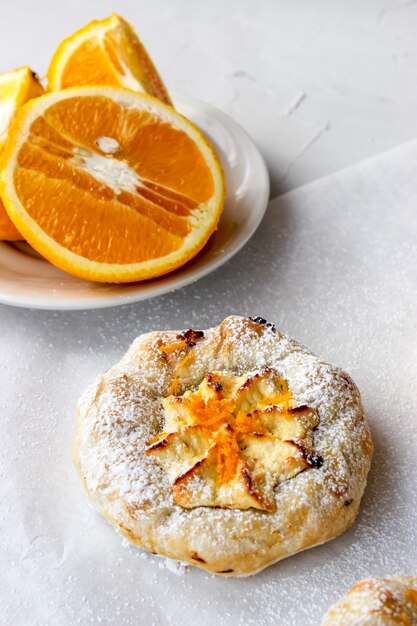 Cheesecakes with cottage cheese sprinkled with orange shavings