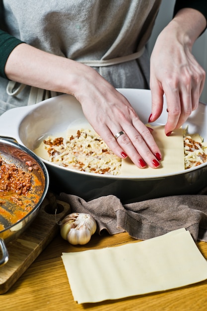 The chef cooking homemade Italian lasagna 