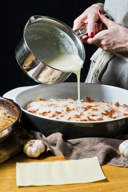 The chef cooking homemade Italian lasagna 