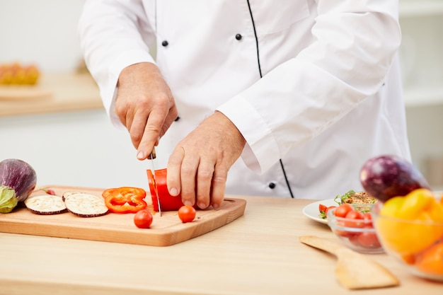 Chef Cutting Vegetables Closeup