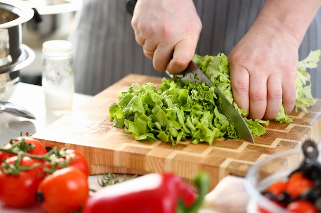 Chef Hands Cutting Green Fresh Lettuce Ingredient