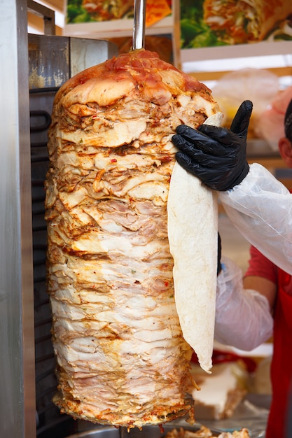 Chef lubricate pita bread