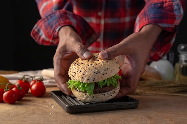 Chef making hamburger homemade.