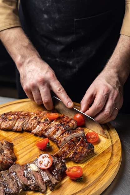 the chef prepares the meat. Close-up