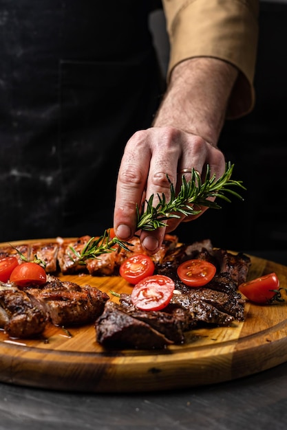 the chef prepares the meat. Close-up