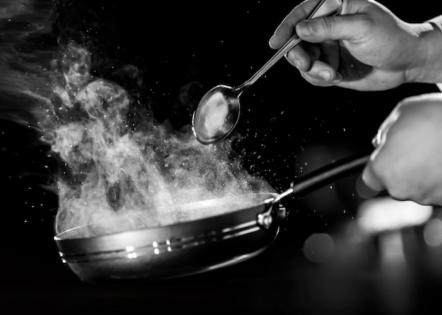 Chef preparing food in the kitchen, chef cooking	