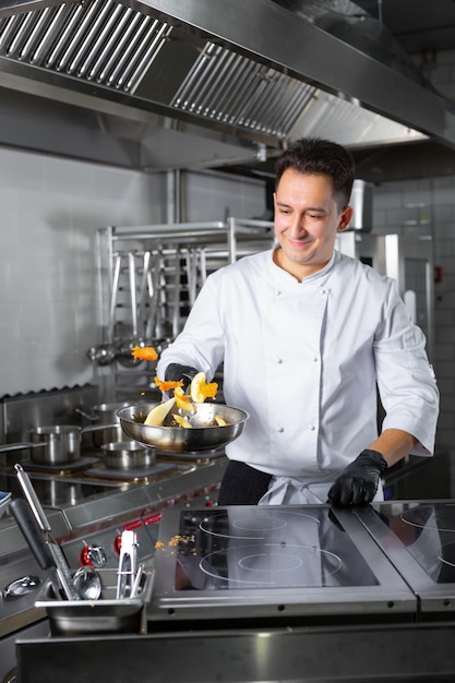 chef preparing ludo in a restaurant for guests